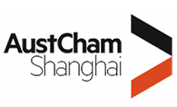 AustCham Shanghai logo. Black prism angled from top left down to center right. Orange prism angled from bottom left up to centre right.
